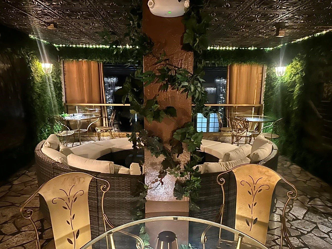 The Mezzanine event space at Kairos with ambient lighting and VIP seating